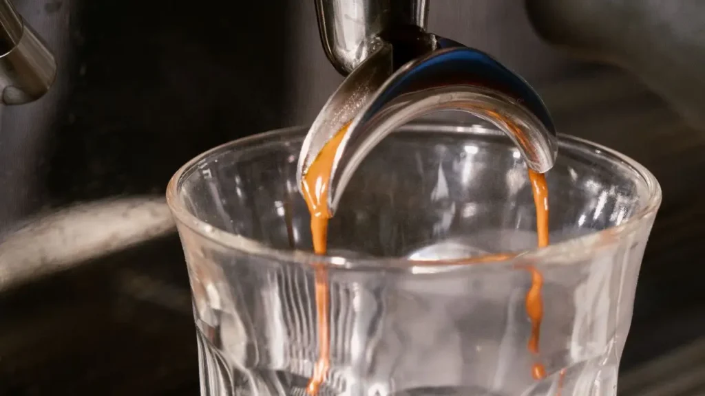 Dark roast coffee espresso extraction prepared for a commercial program, showing rich crema and stable performance.