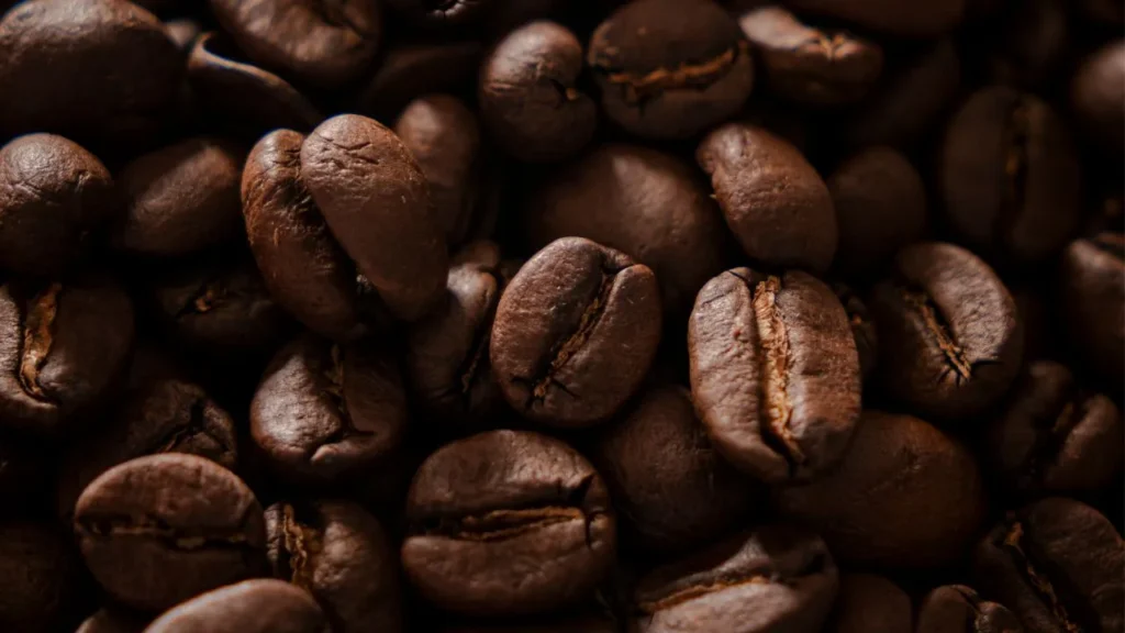 Close-up of roasted coffee beans highlighting structure and roast development consistency