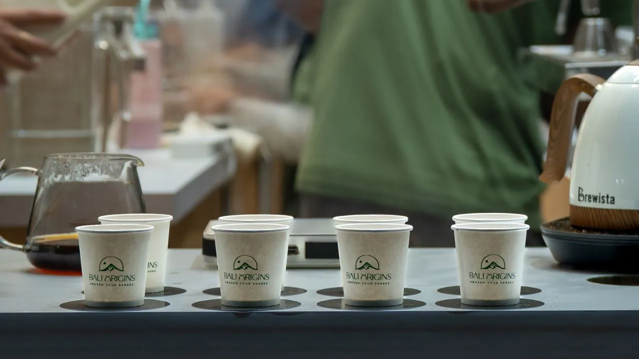 Freshly brewed washed coffee presented through curated tasting sessions at the Bali Origins booth during World of Coffee Bangkok.